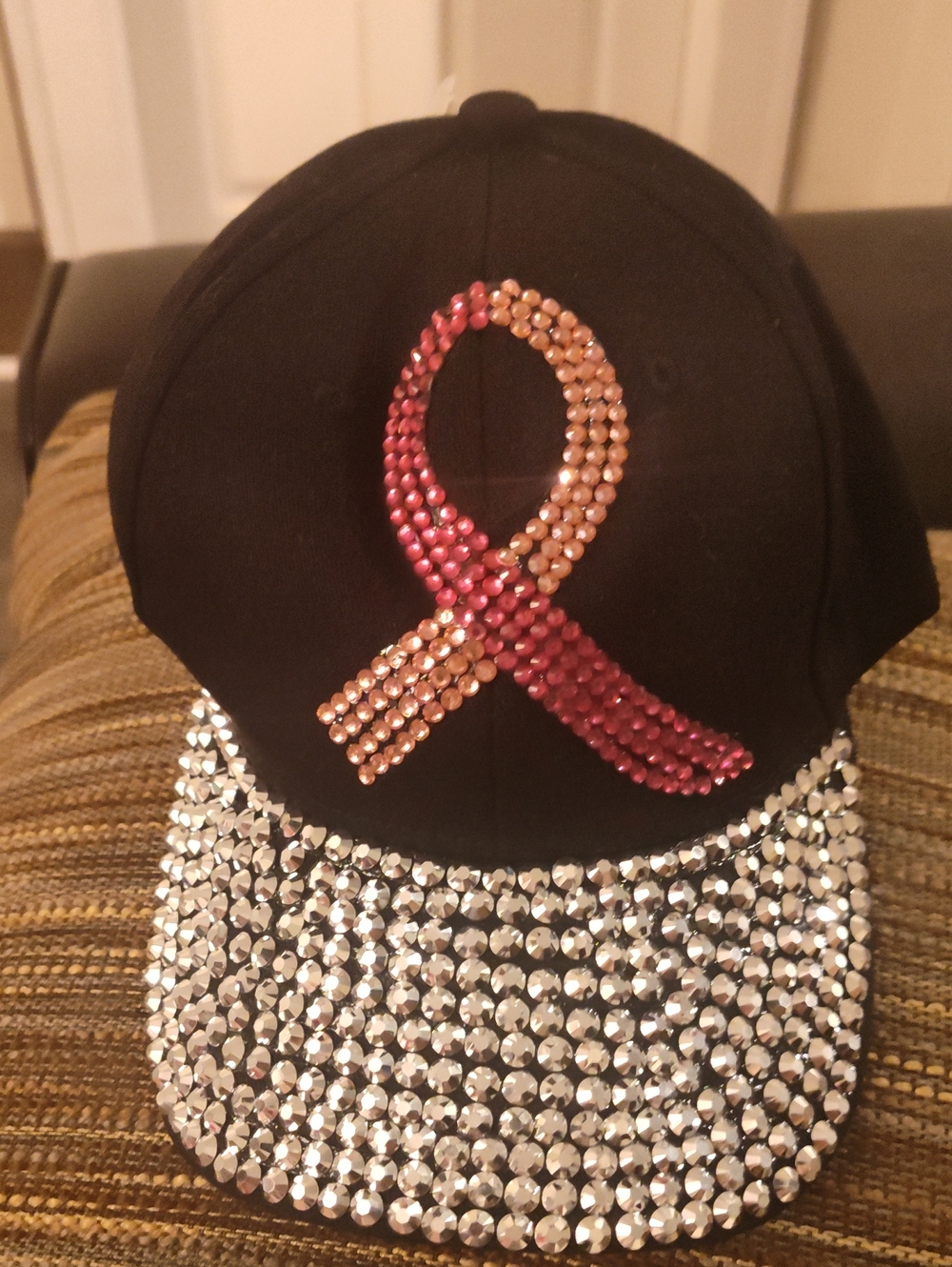 Cato Black Cap with Pink and Gold Rhinestone Ribbon and Silver-Brim Accent